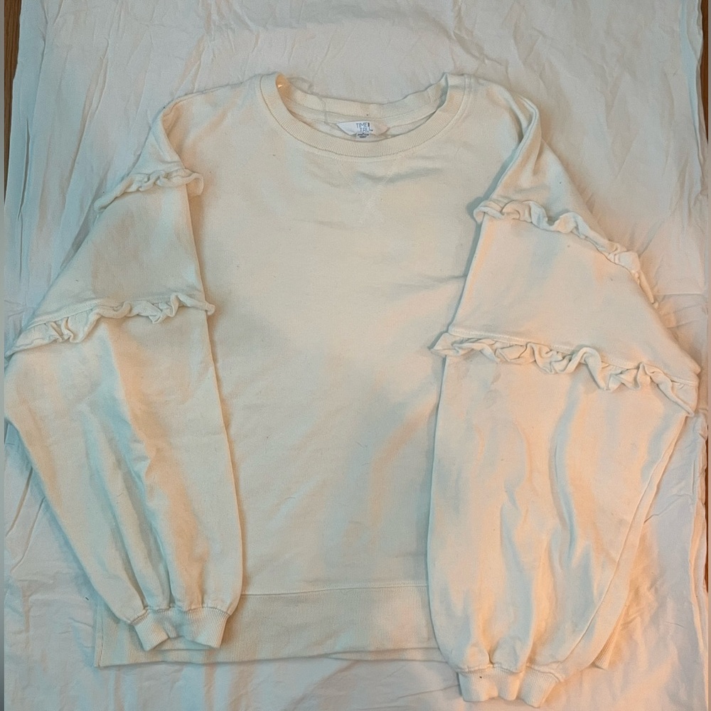 White crewneck with ruffle sleeves